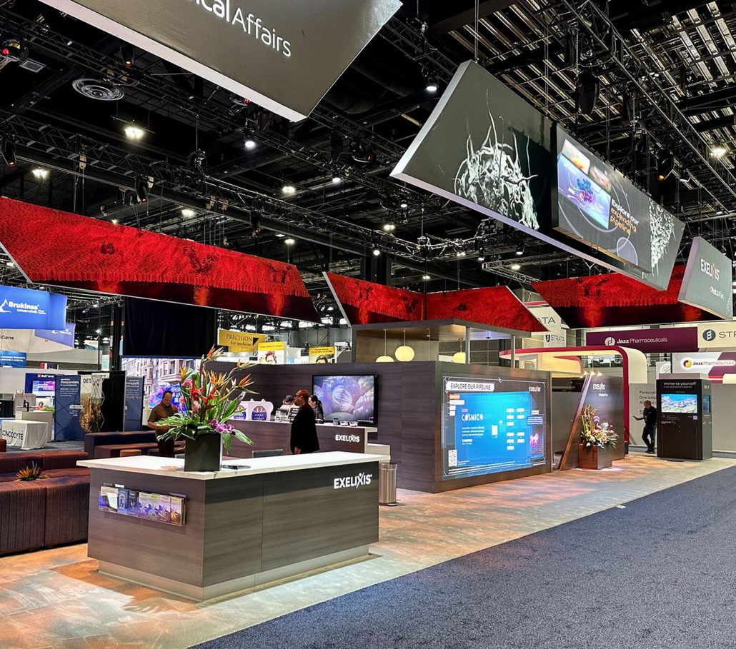 Photo of a congress booth showcasing AXS Studio work